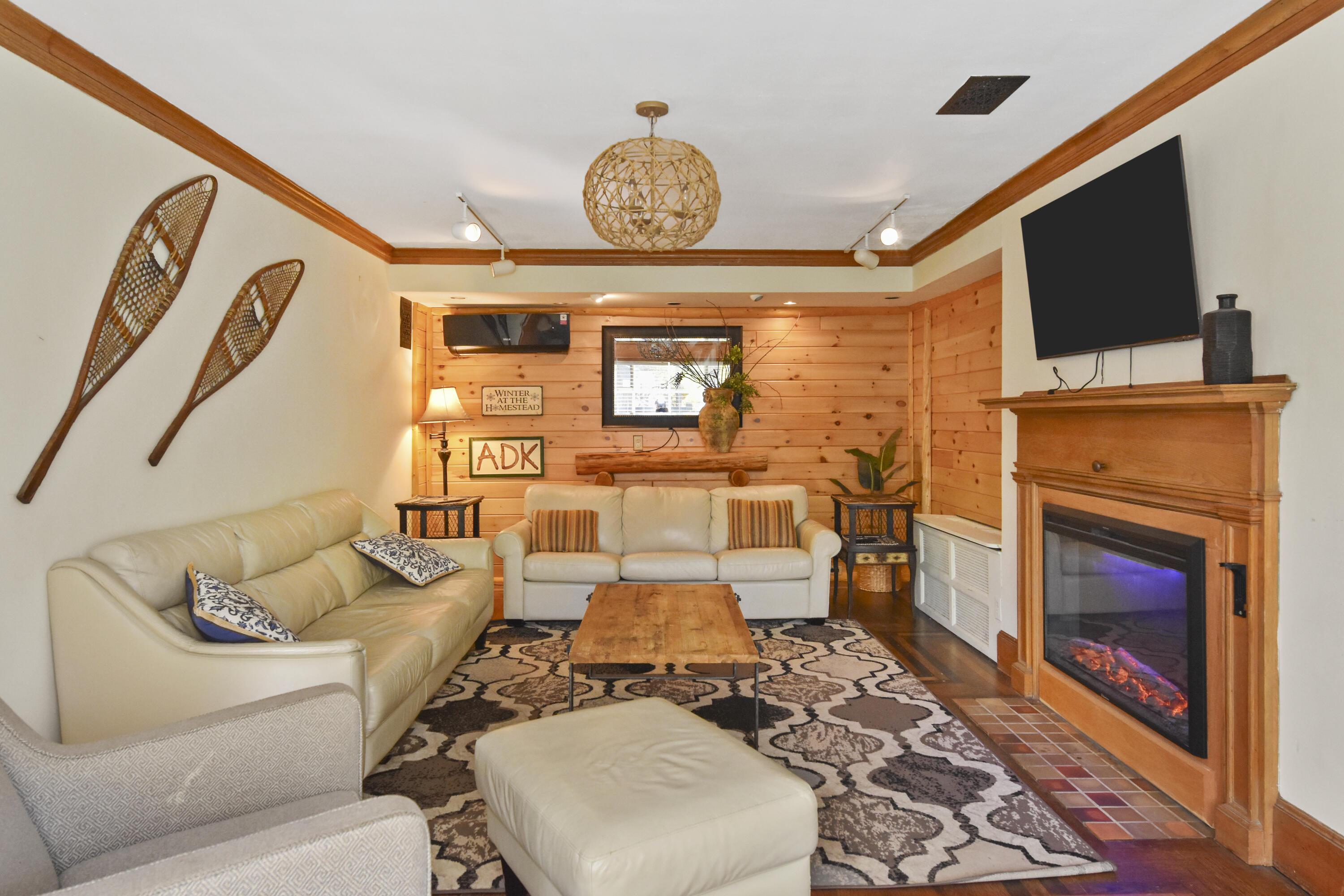 Image 4: Furnished Living Room with Fireplace