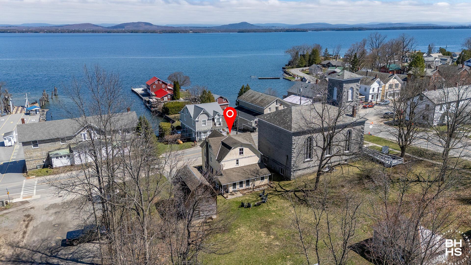 Image 2: EssexHomeWithLakeViews_S_A_Exterior_Back