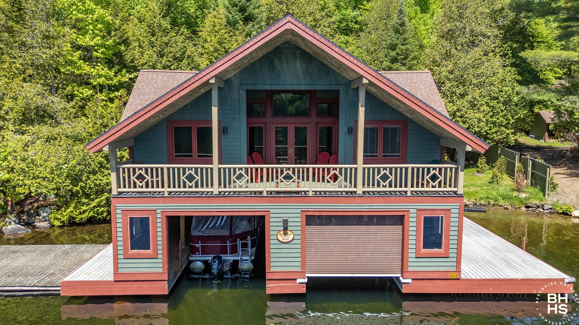 Image 2: BoatAccessCampOnLP_Summer_A_Boathouse_M