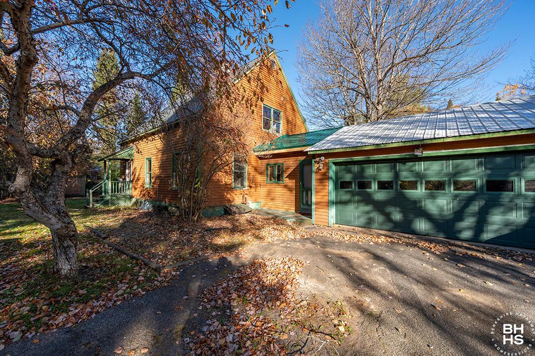 Image 1: HomeInRainbowLake_Exterior_Front_R