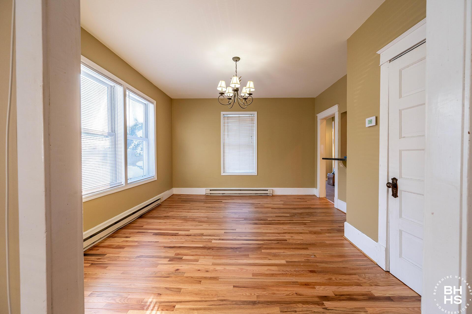 Image 4: ApartmentBuildingOnElm_Apt1_DR_From_LR