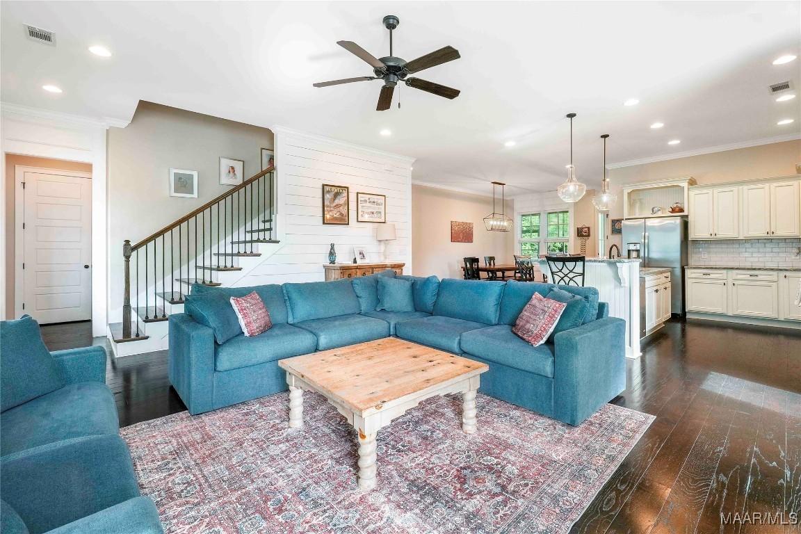 Image 3: Rich hardwood floors, crown molding, recessed ligh