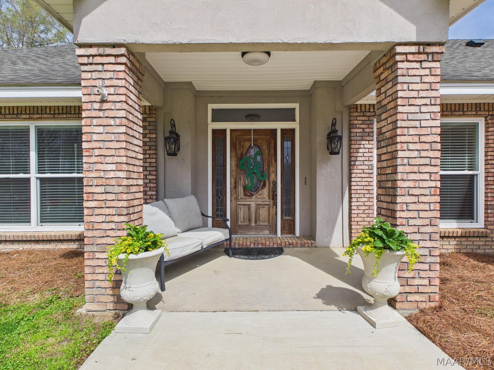 Image 2: Front entrance of the home
