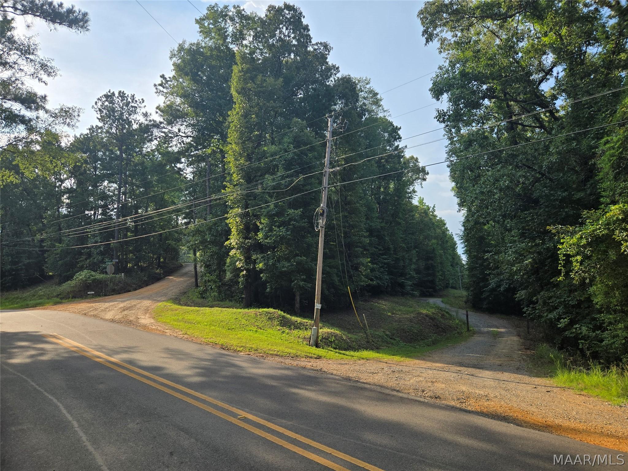 Image 3: Driving up Shady Acres to Ashwood Drive. Property