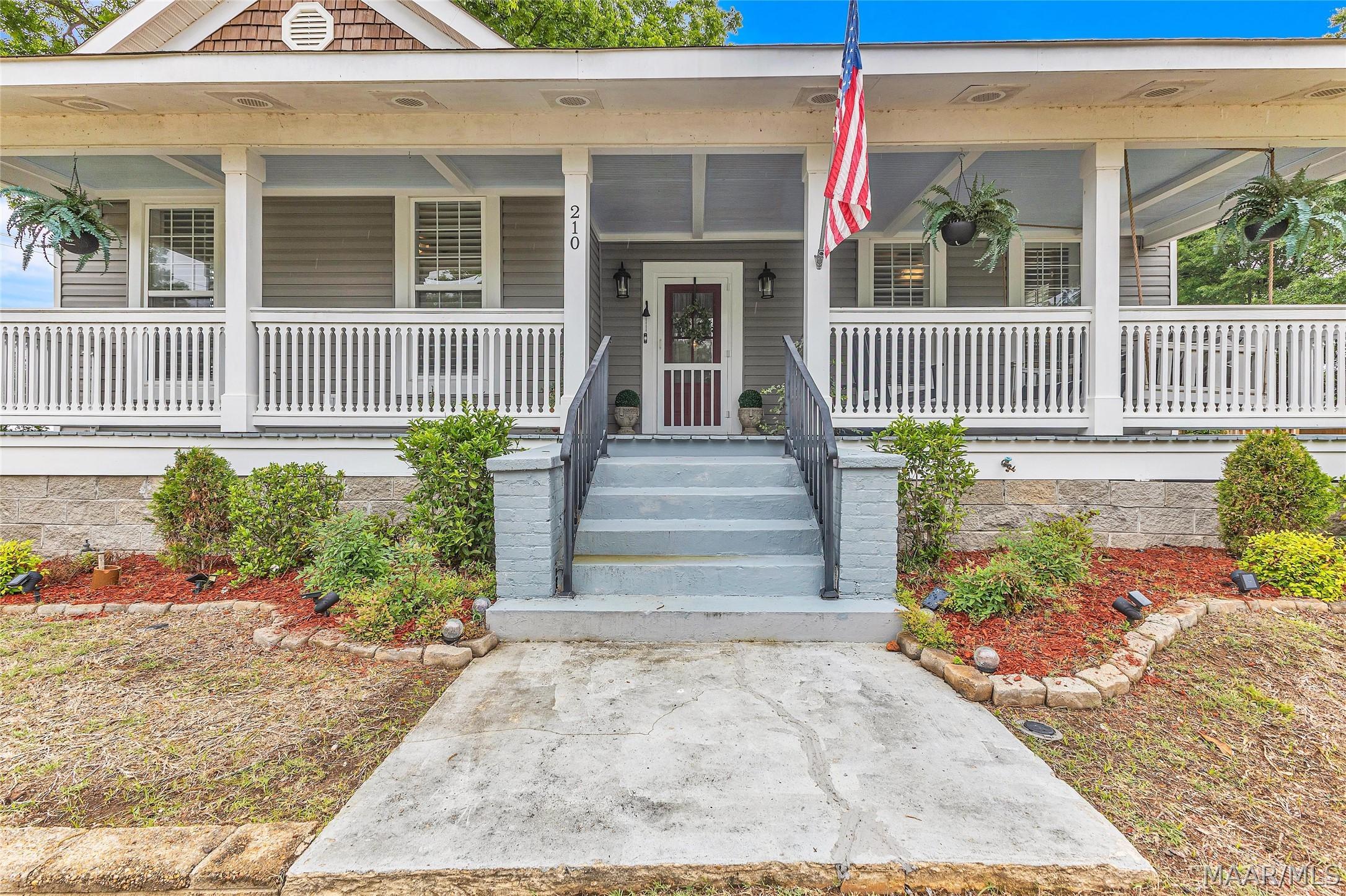Image 2: Don't you love a front porch?  Recently repainted.