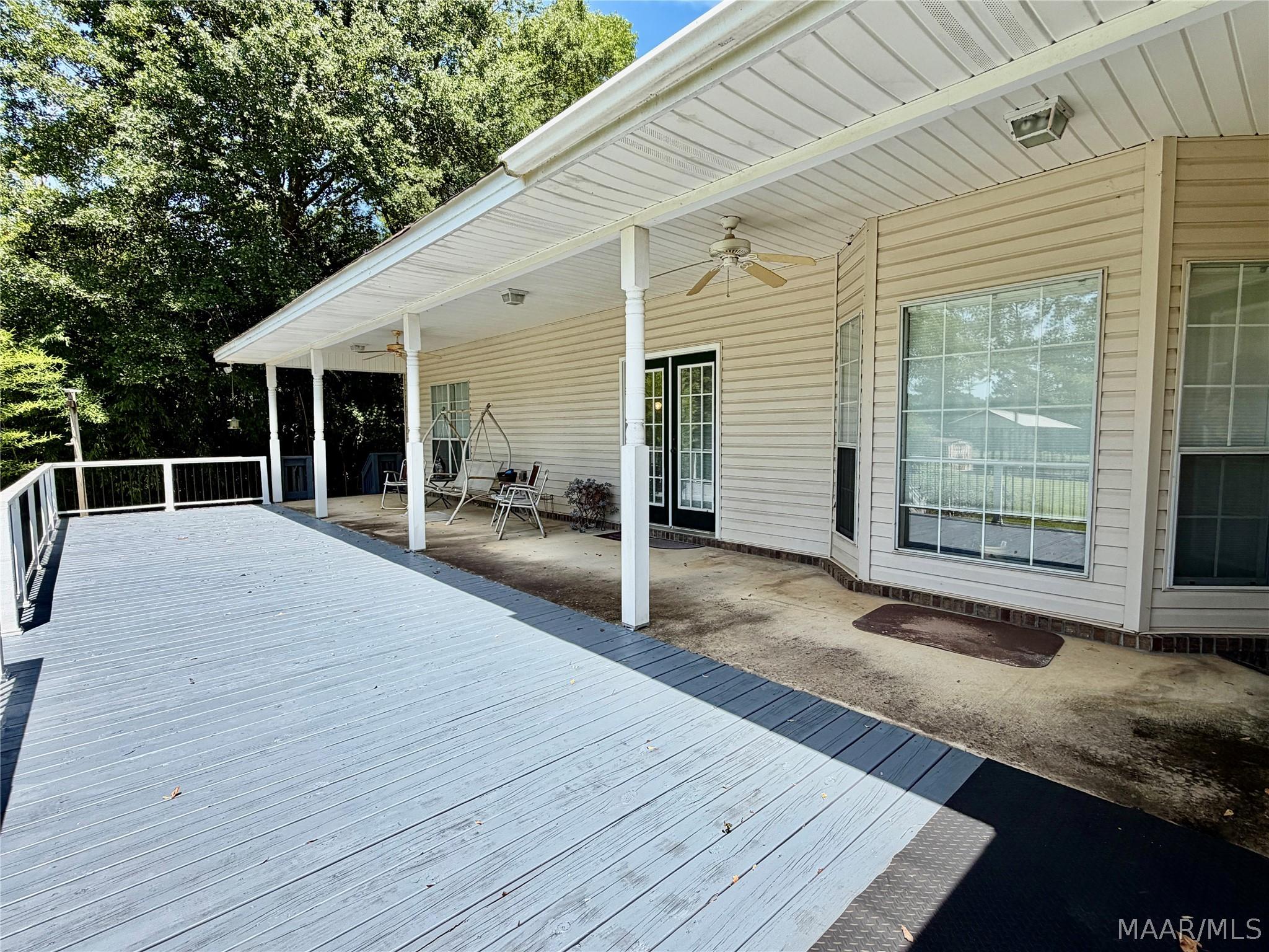 Image 4: Large deck attached to back porch