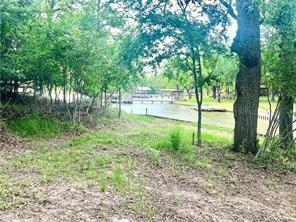 Image 4: View of yard featuring a water view