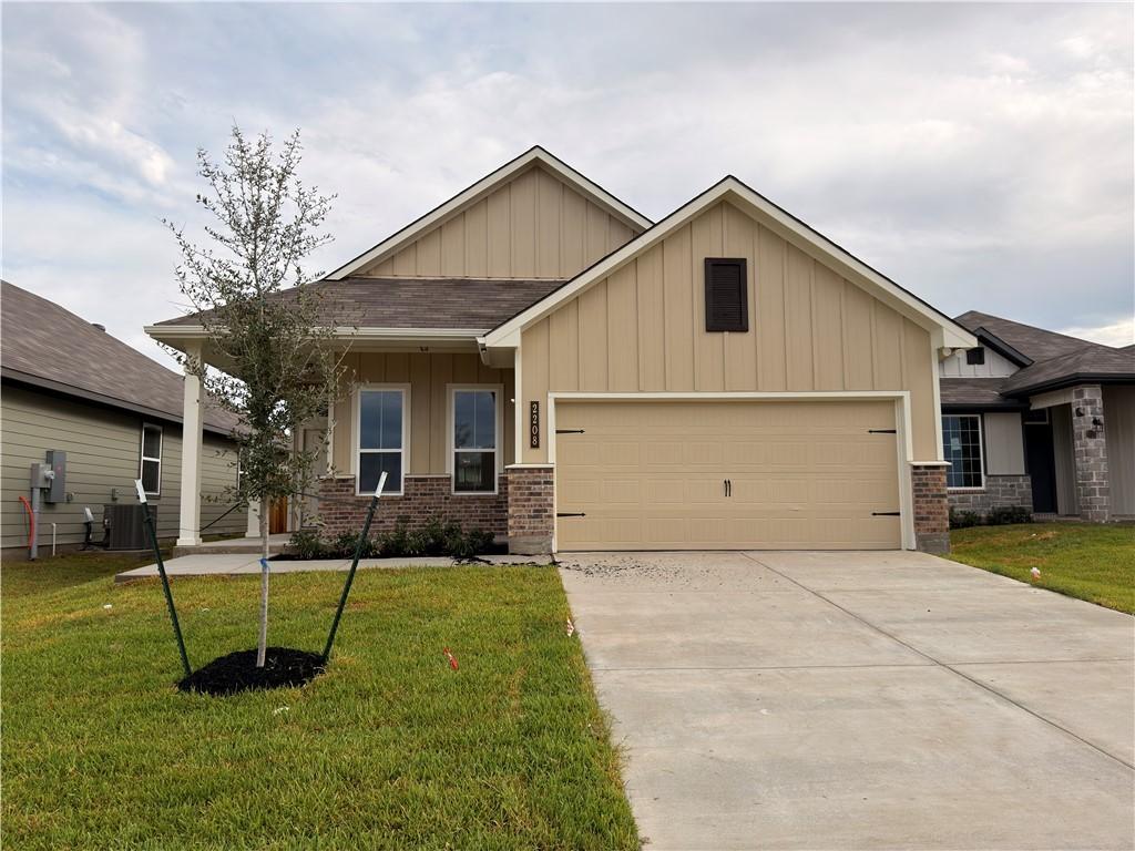 Image 1: Craftsman house featuring board and batten siding,