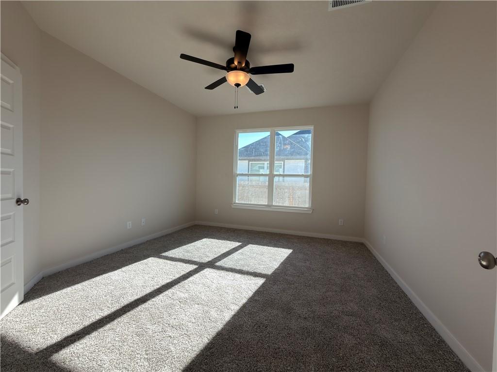 Image 4: Spare room featuring carpet floors and ceiling fan