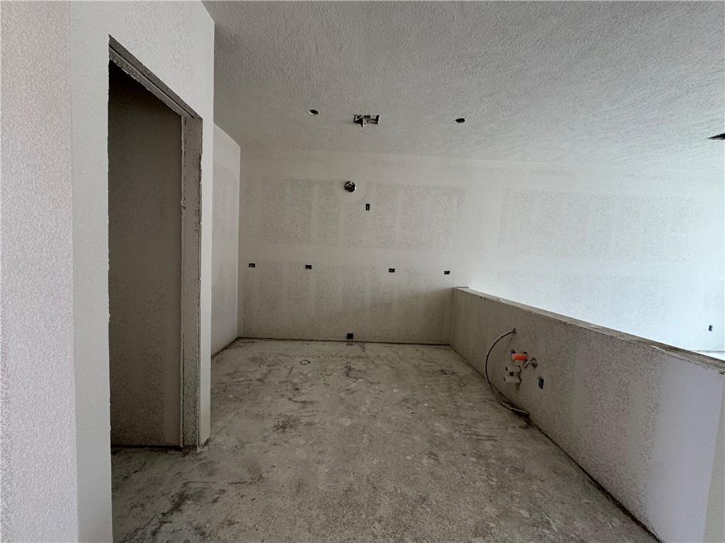 Image 4: Bathroom with a textured ceiling