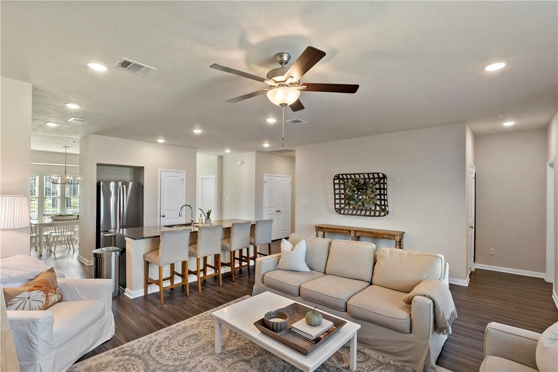 Image 3: Living room with recessed lighting, a ceiling fan,