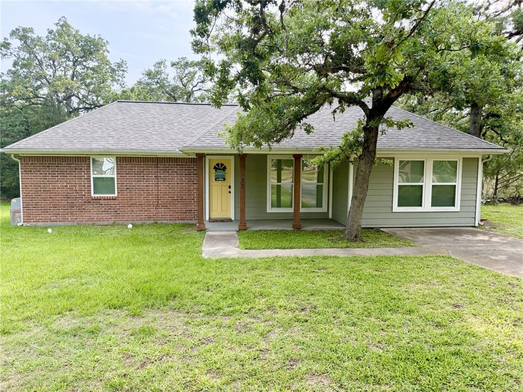 Image 1: Single story home with roof with shingles, covered