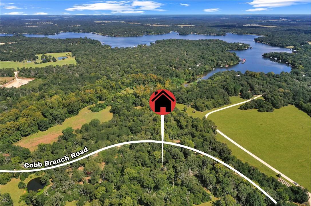 Image 1: Aerial view of property and surrounding area featu