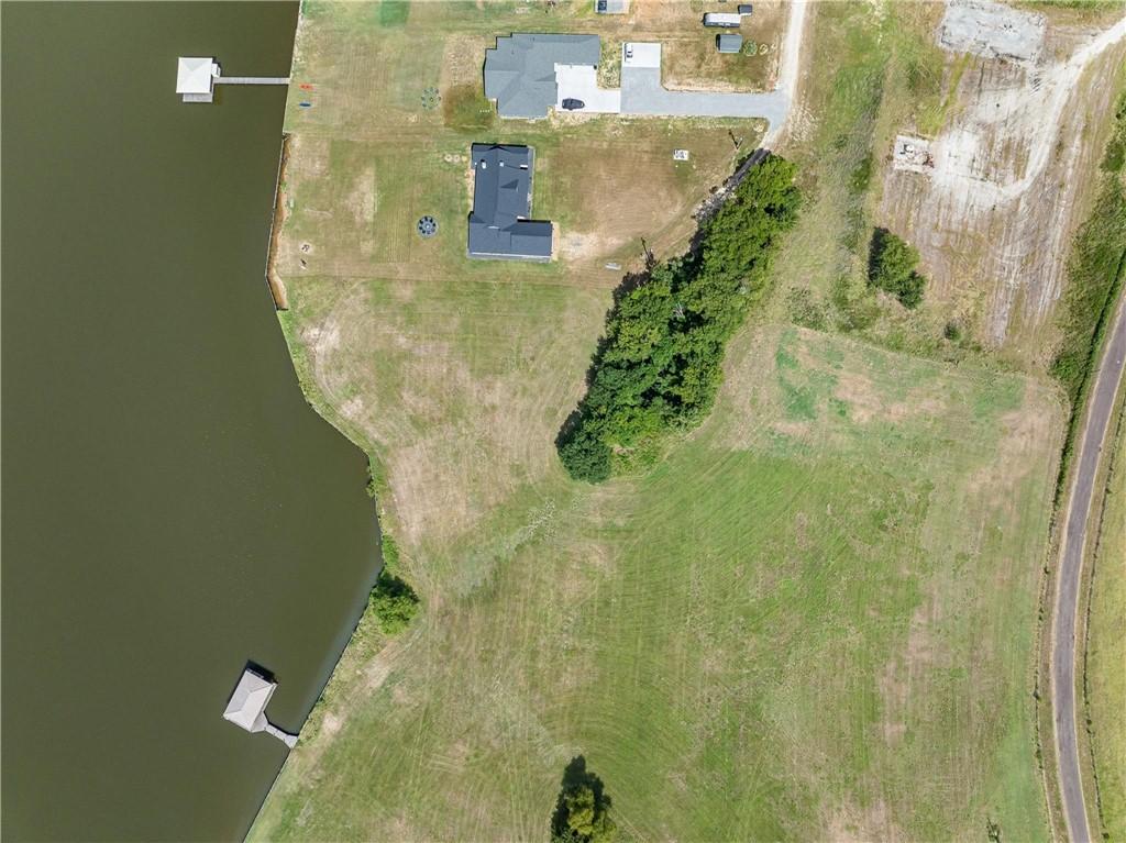 Image 2: Aerial overview of property's location with a larg