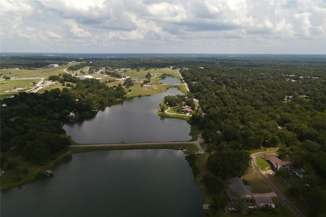 Image 4: Aerial view of property and surrounding area with