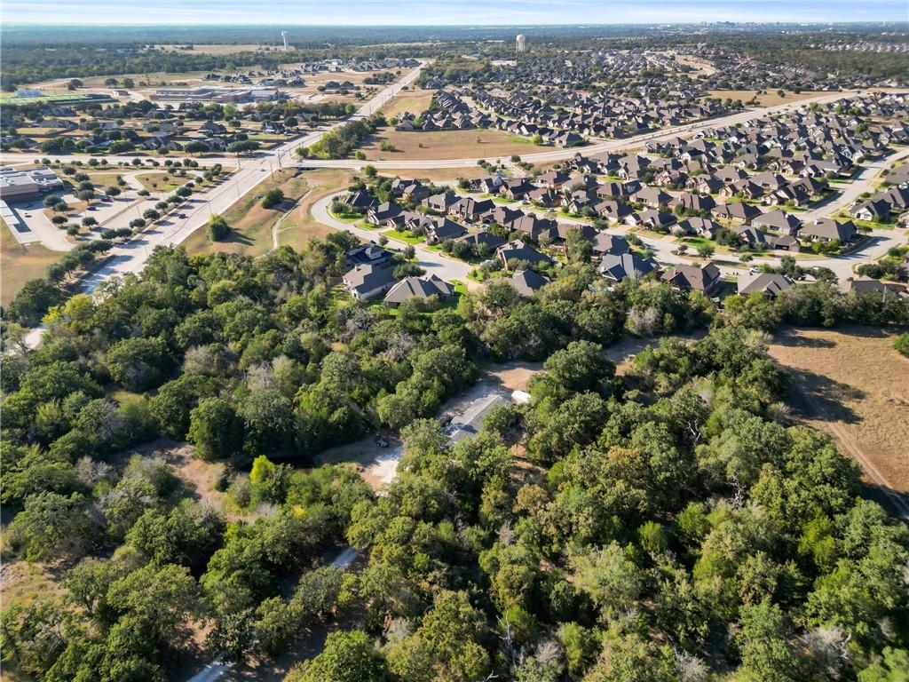 Image 3: Aerial view of property and surrounding area