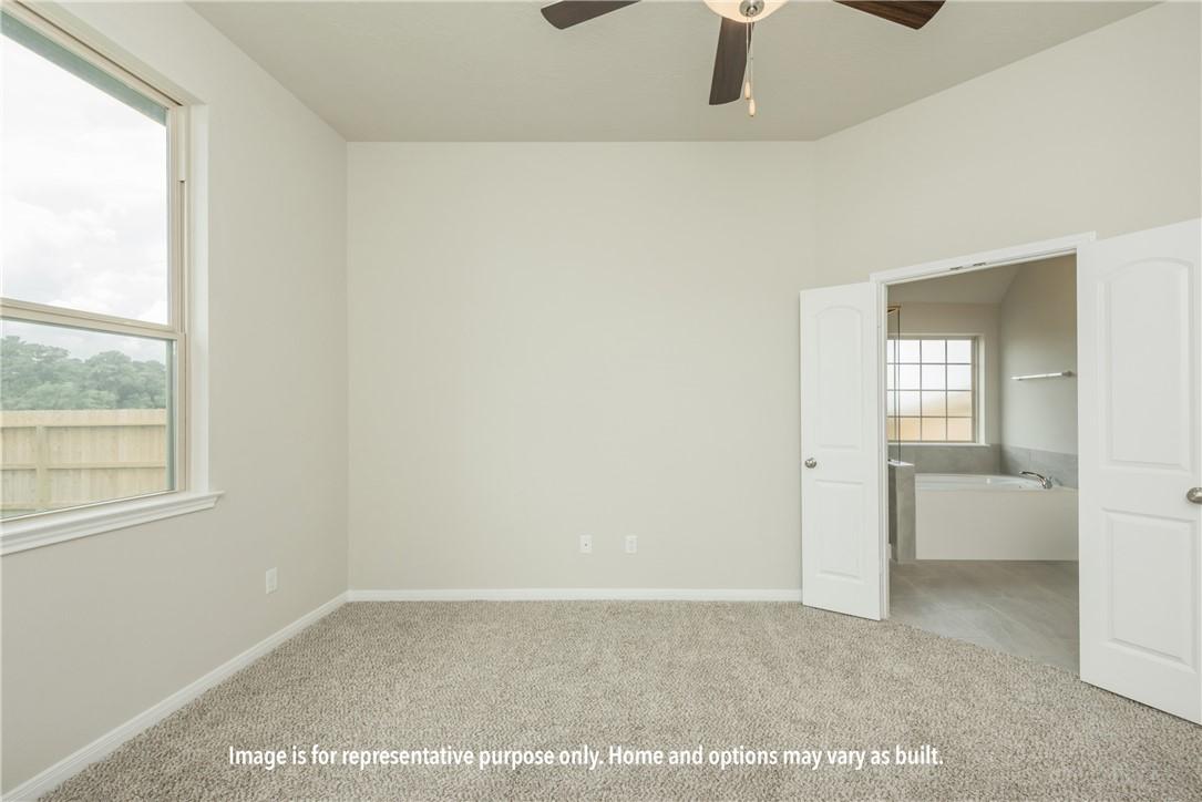 Image 3: Unfurnished bedroom with light colored carpet, cei