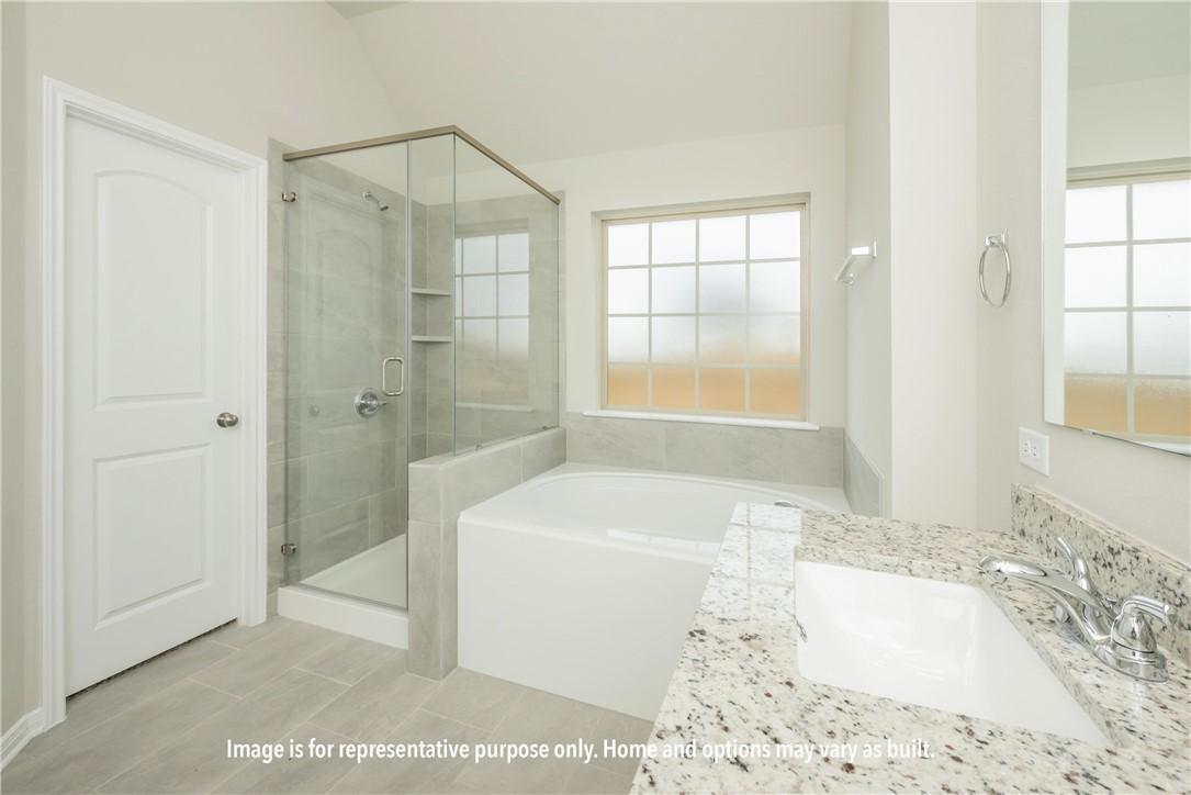 Image 4: Full bath with a bath, a shower stall, and vanity