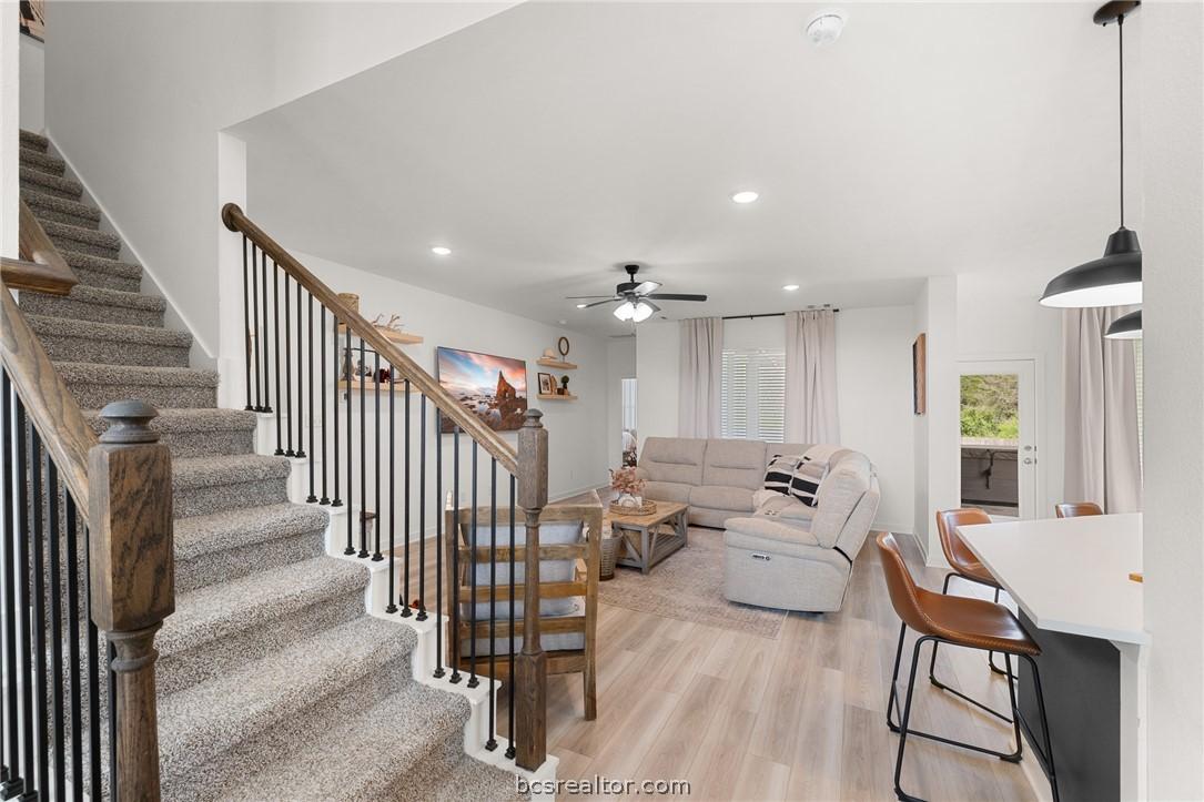 Image 3: Living room is open to the 2 story entryway, kitch