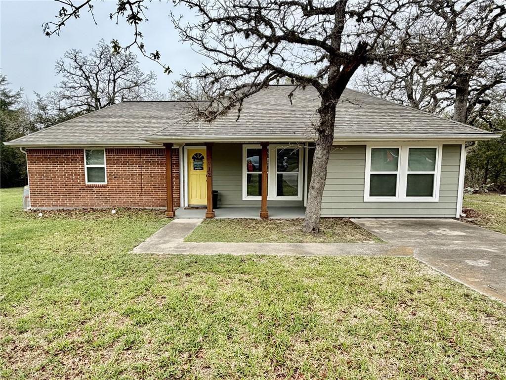 Image 1: Single story home with roof with shingles, covered