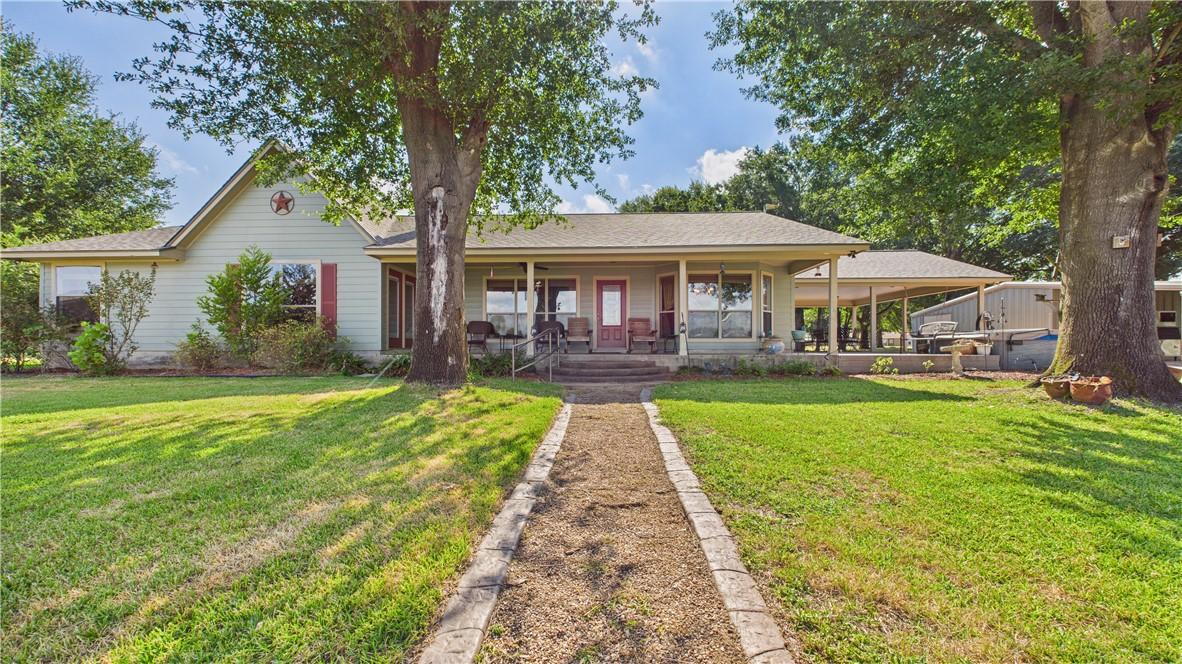 Image 2: View of front of home with a front lawn, a shingle