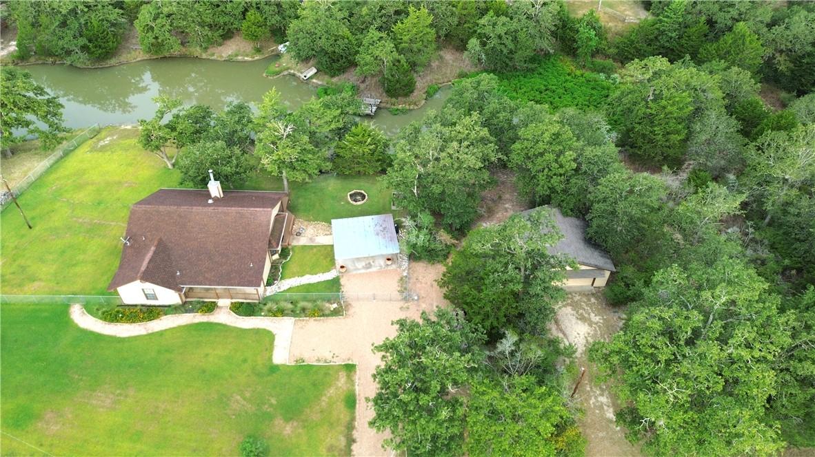 Image 1: Aerial view of property and subdivision pond