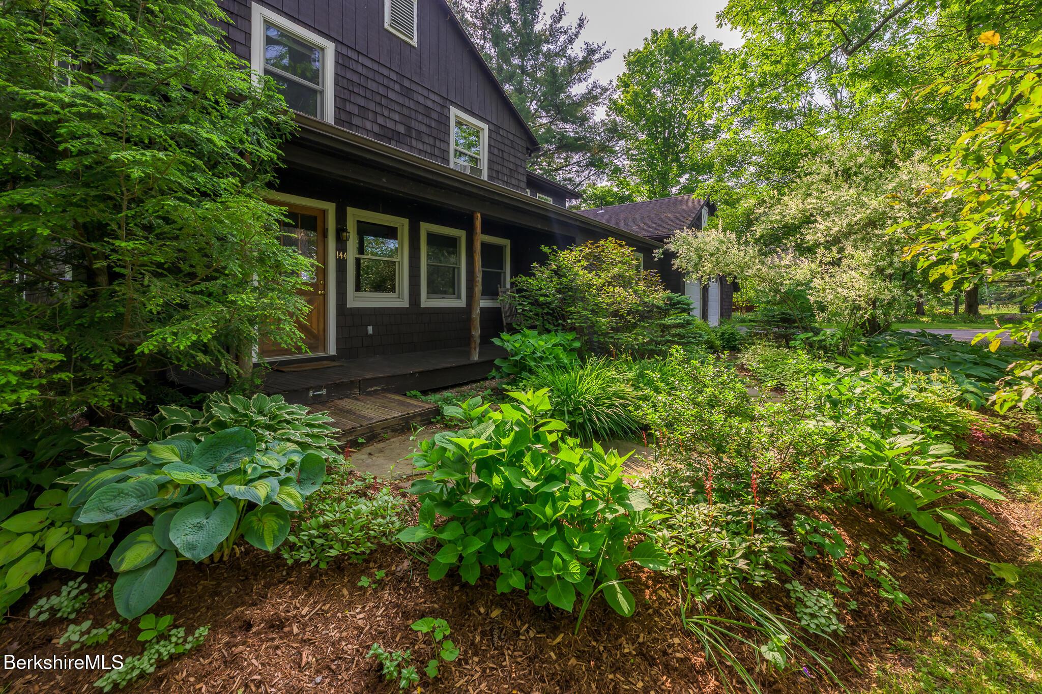 Image 2: Front Door and Rocking Chair Porch