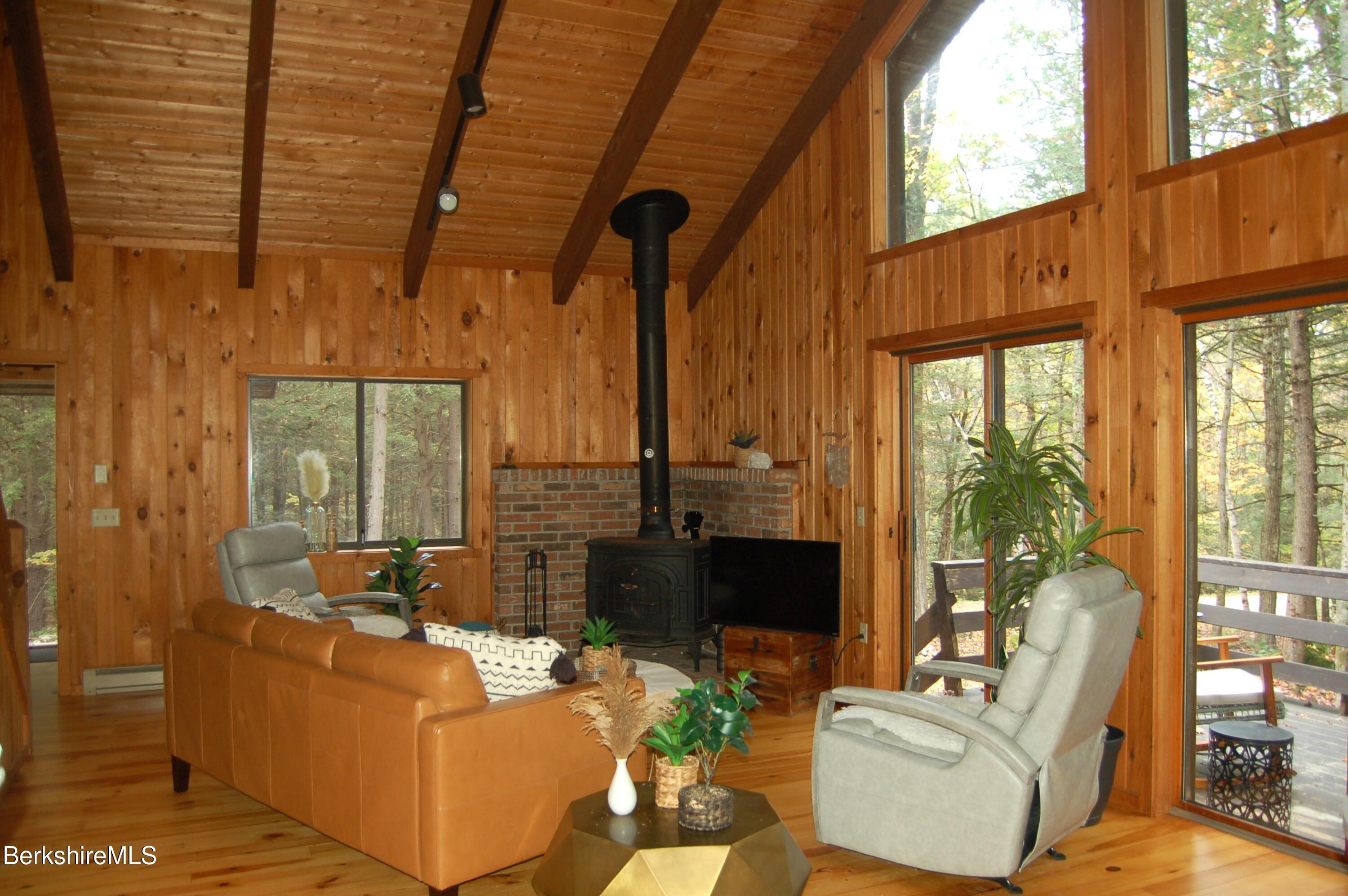 Image 1: open living and dining area