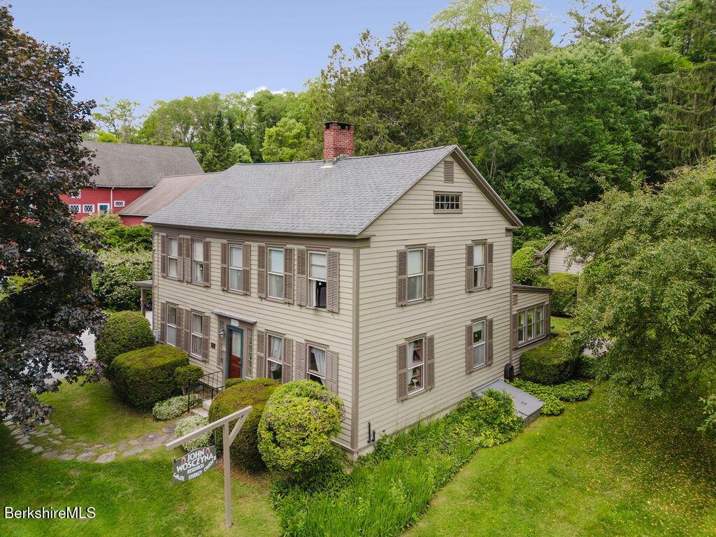 Image 4: side view of house