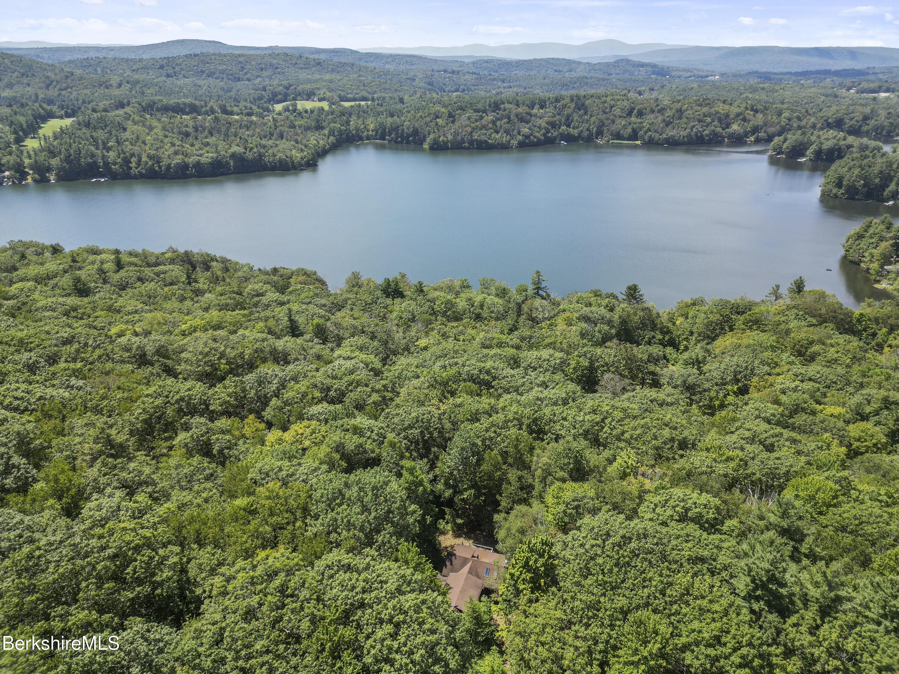 Image 1: 1-Aerial house-lake