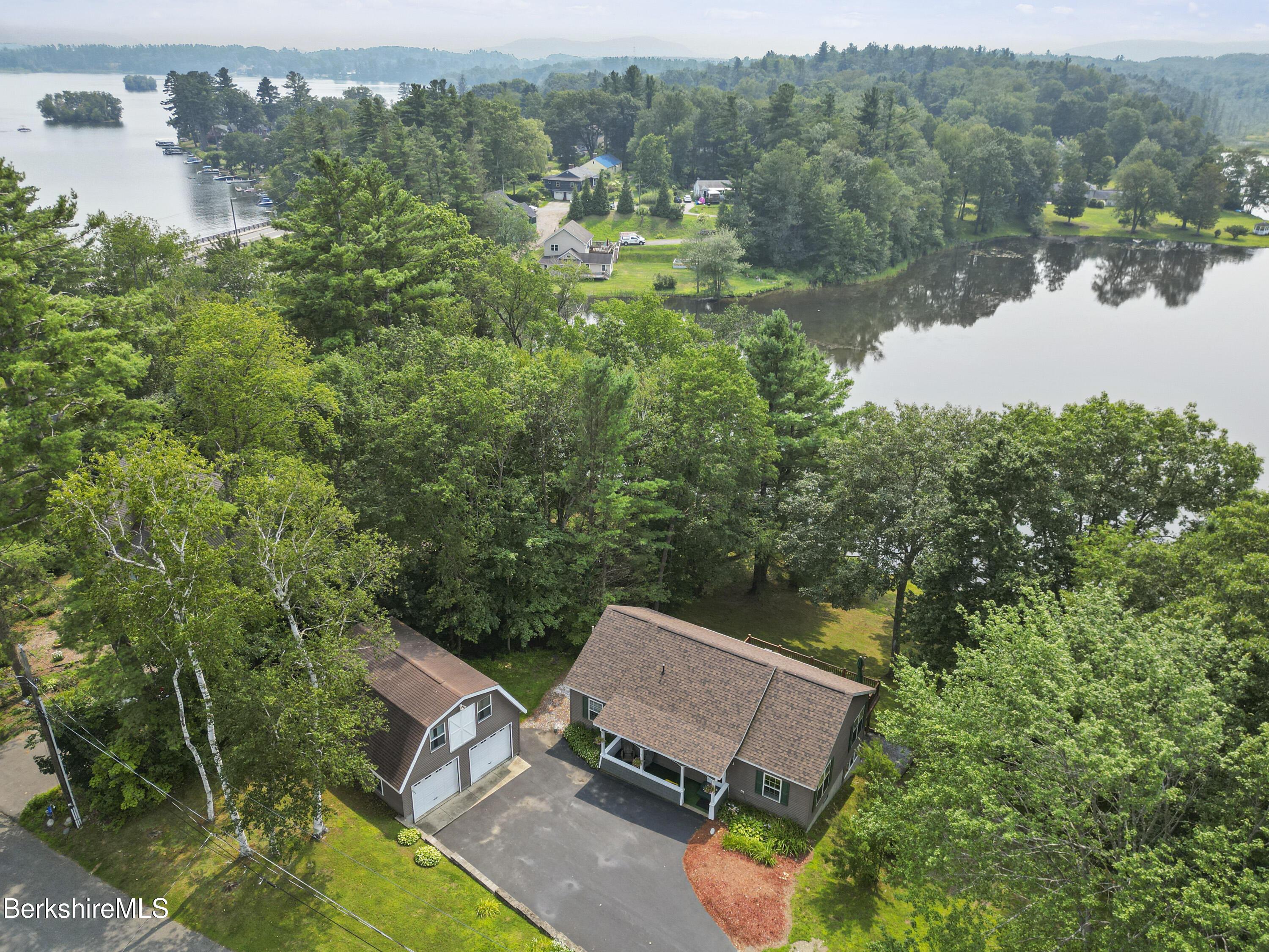 Image 2: Aerial View of Lake & House
