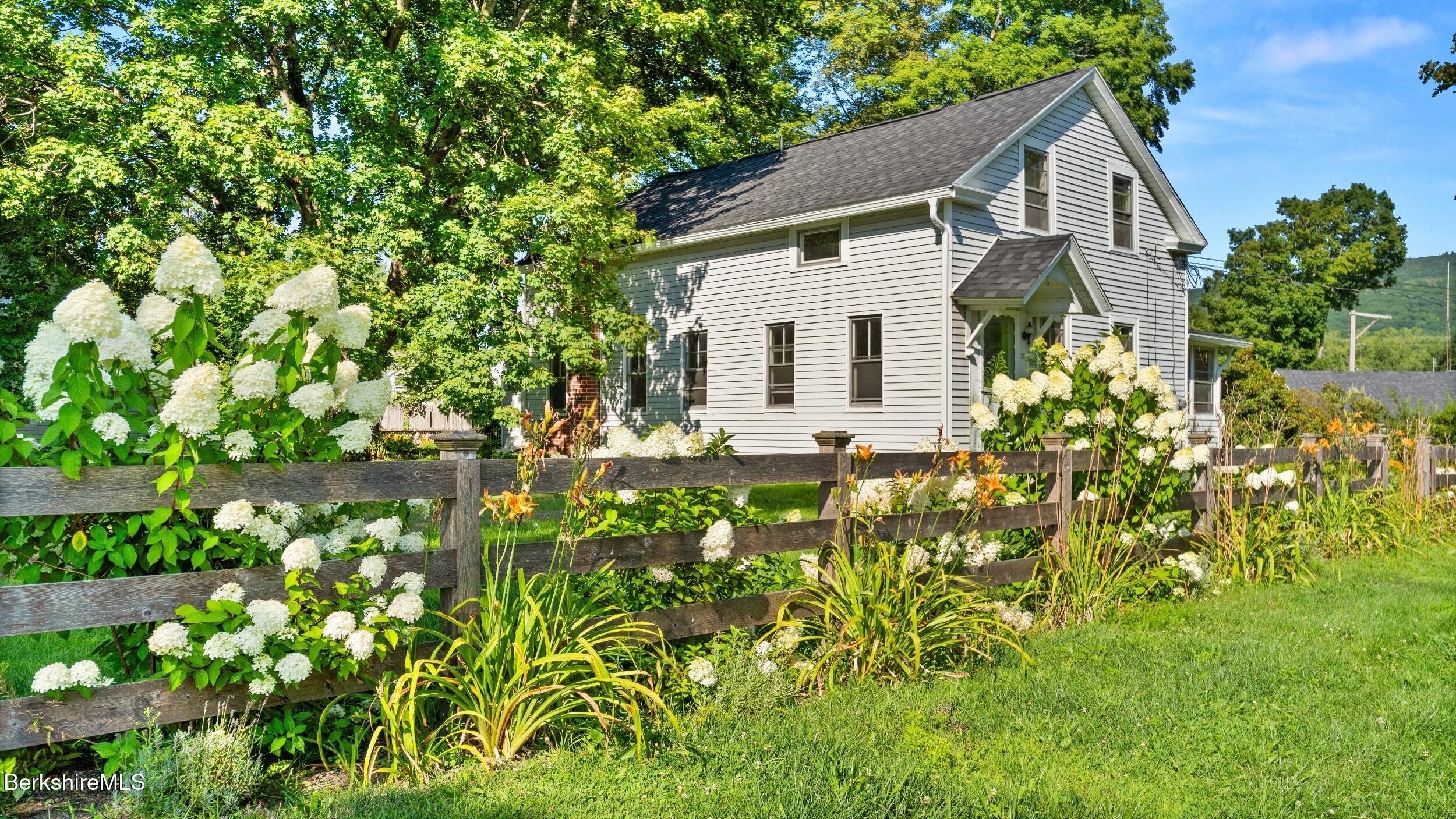 Image 2: House and Fence