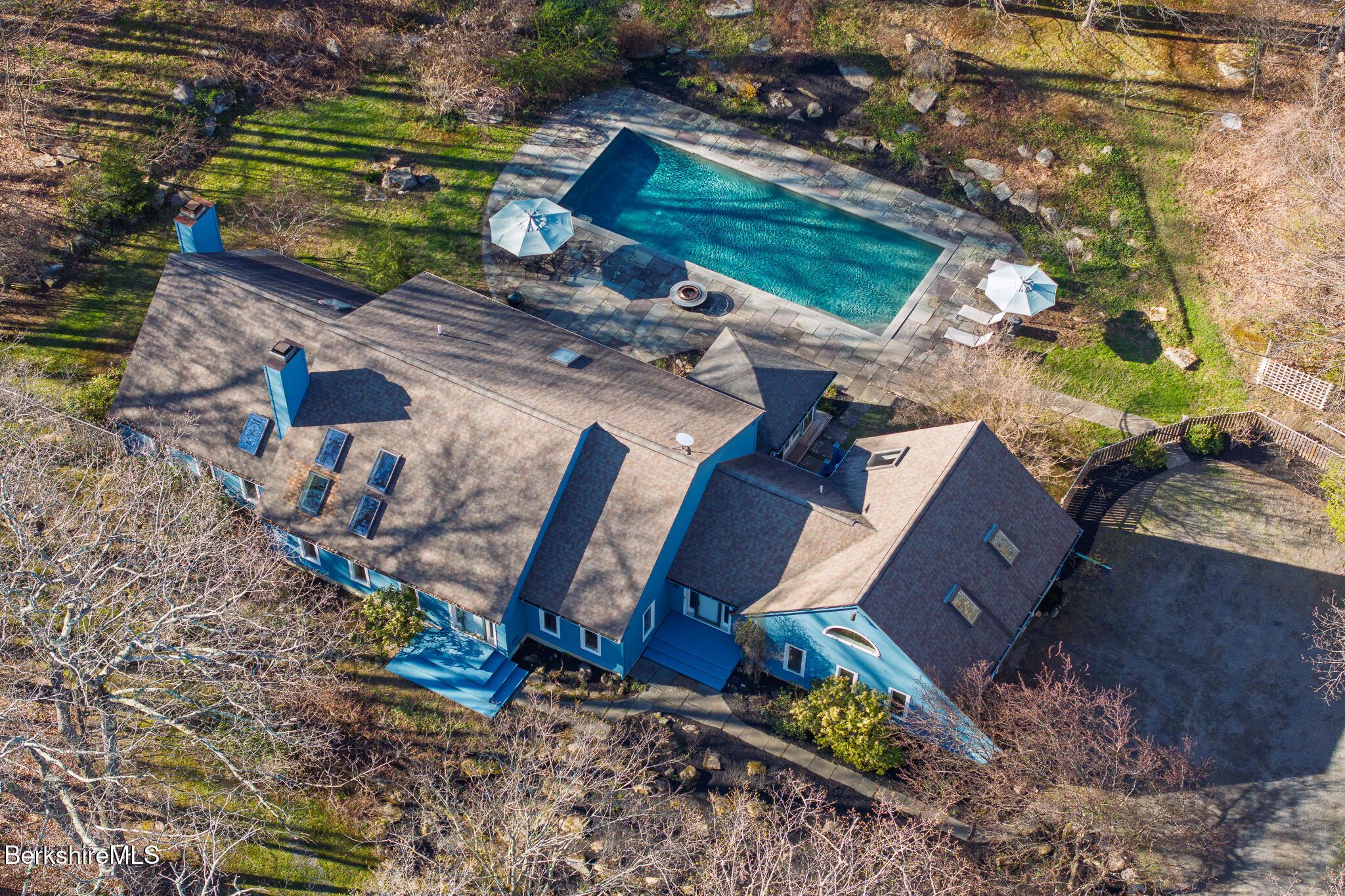 Image 3: HOME AND POOL AERIAL