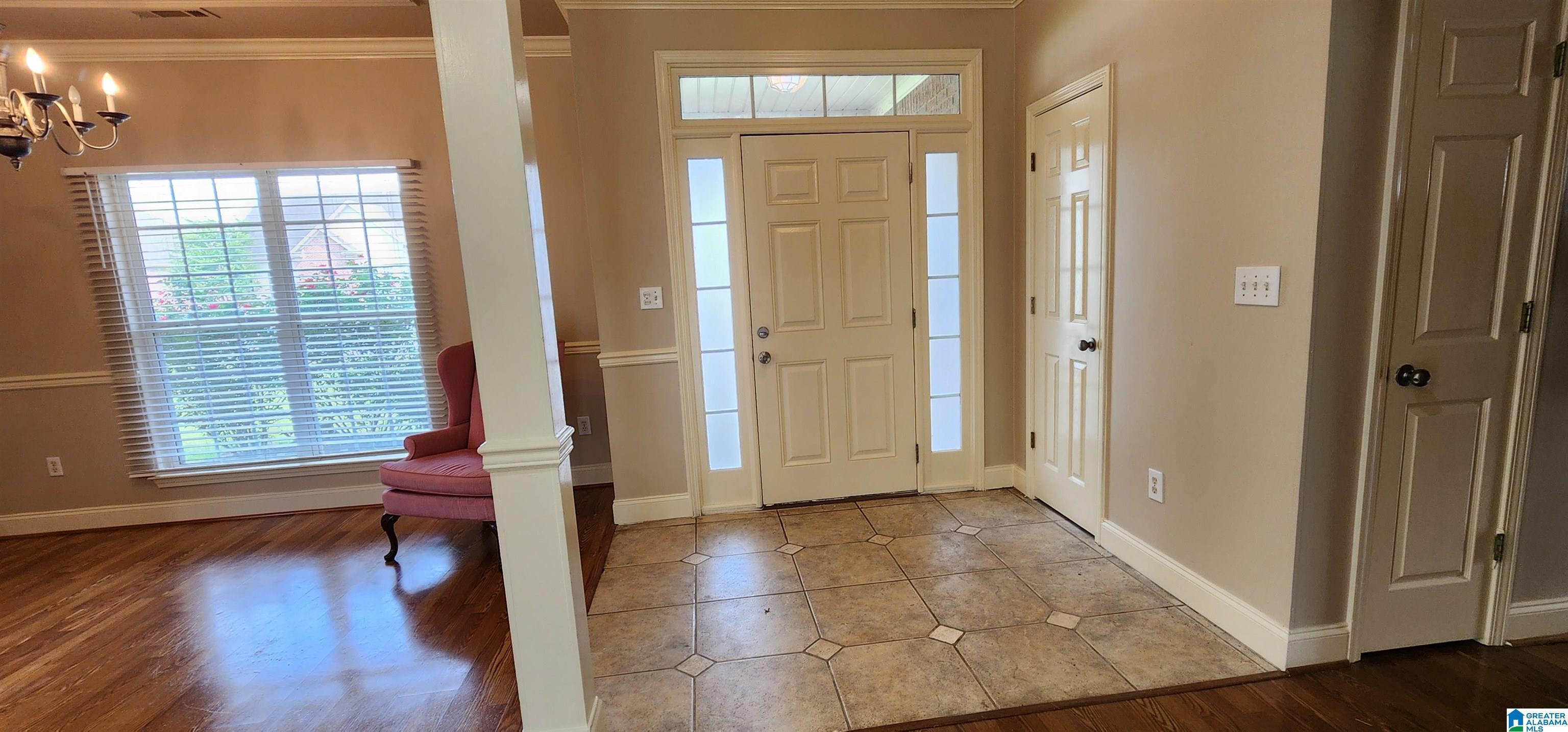 Image 3: Foyer with tile floor.