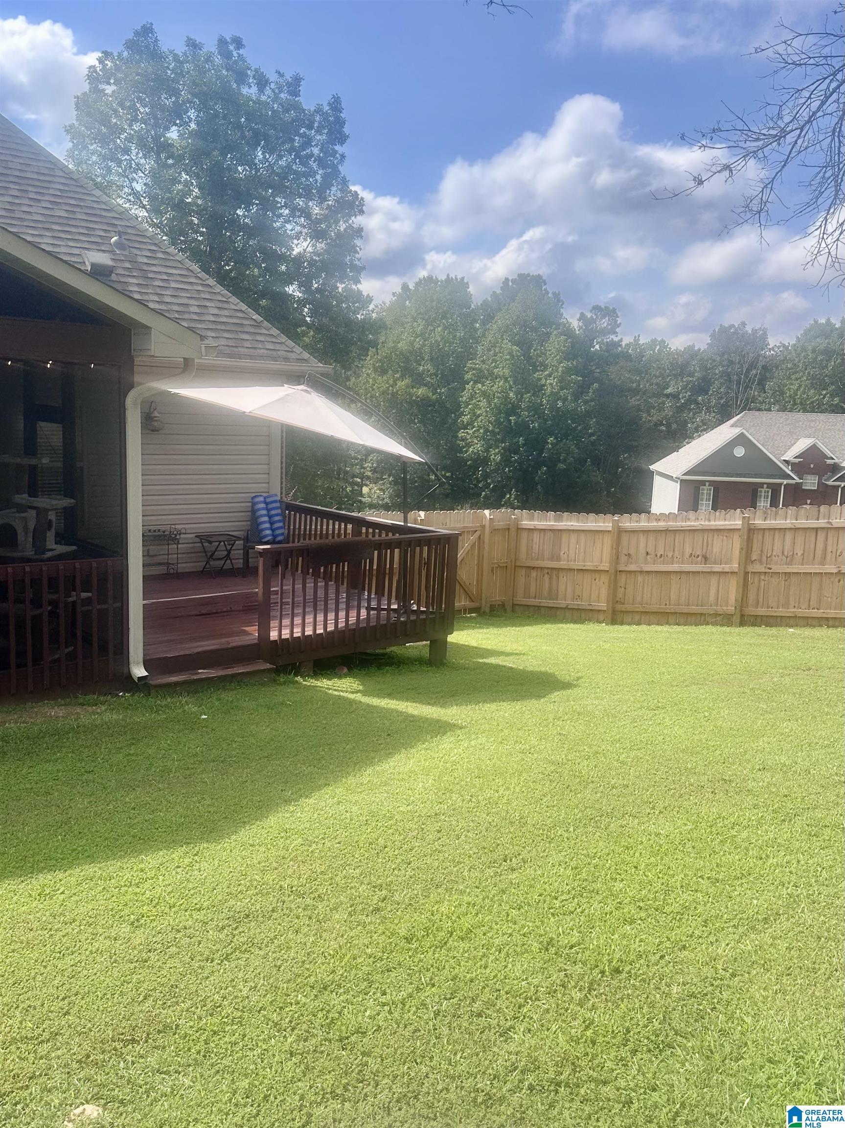 Image 4: big back yard with new privacy fence