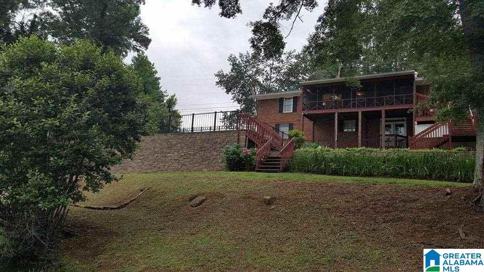 Image 2: back yard view from the lake