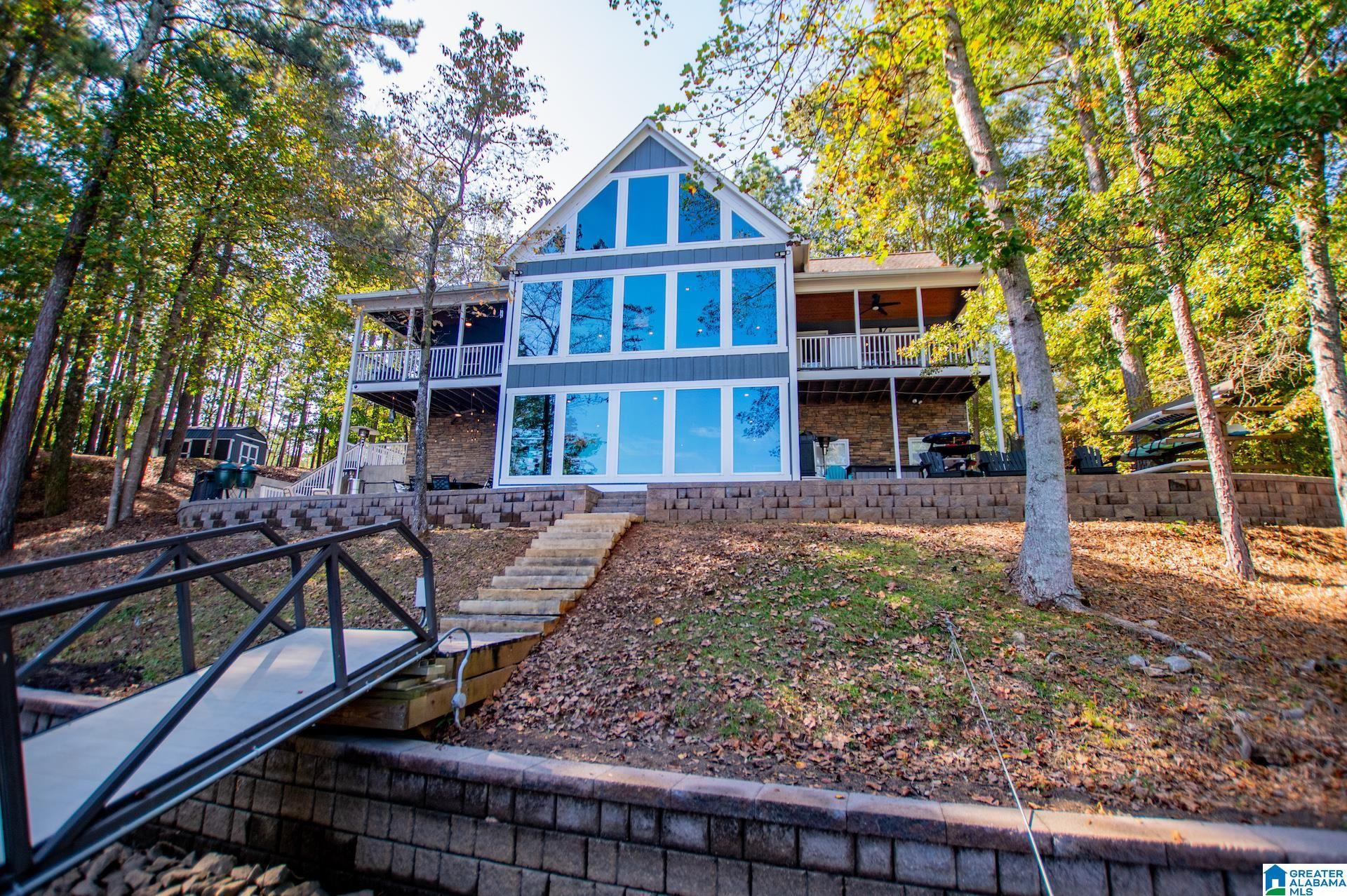 Image 2: VIEW OF HOME FROM THE LAKE