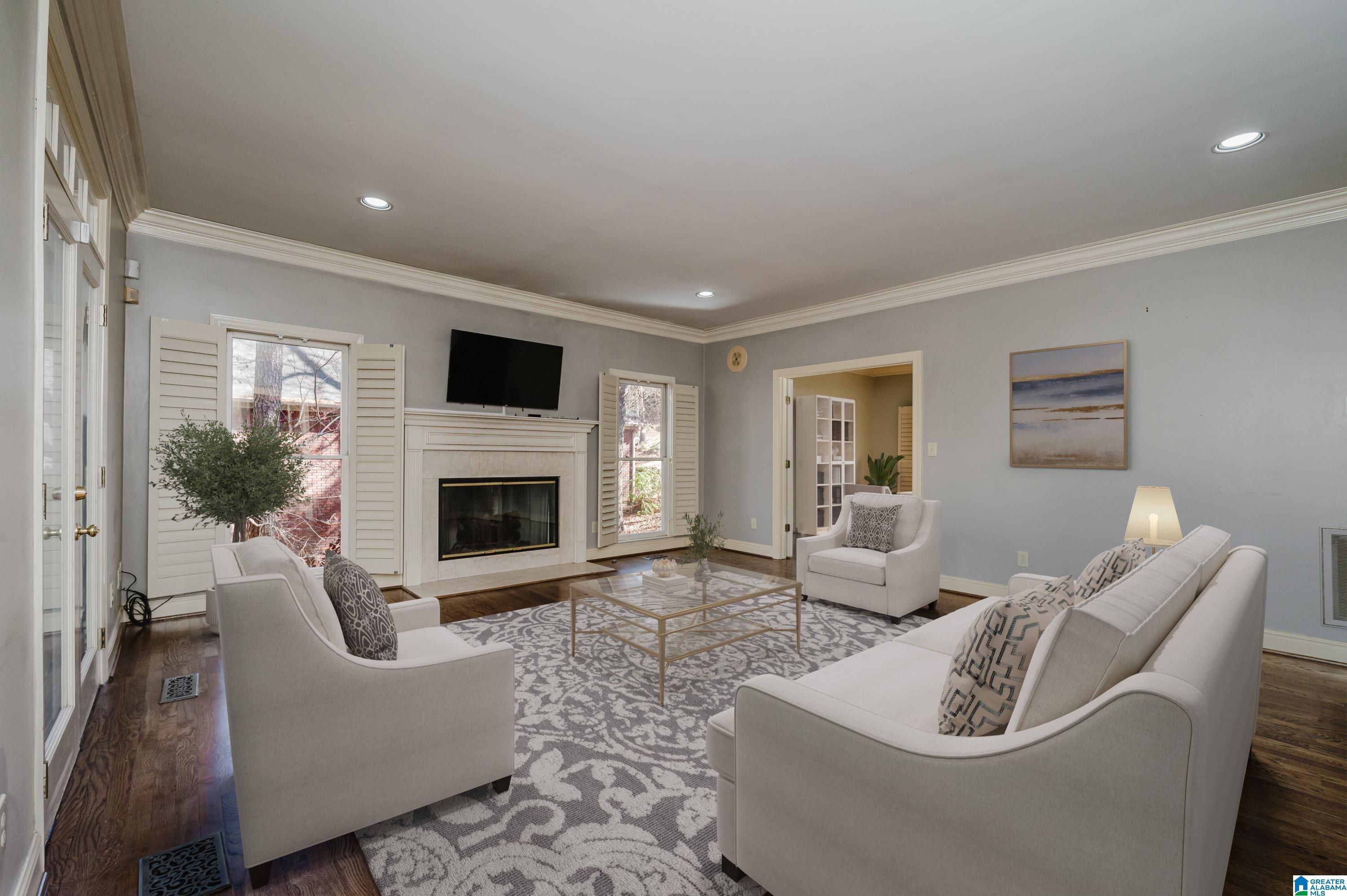 Image 3: Great room with double french doors to back deck