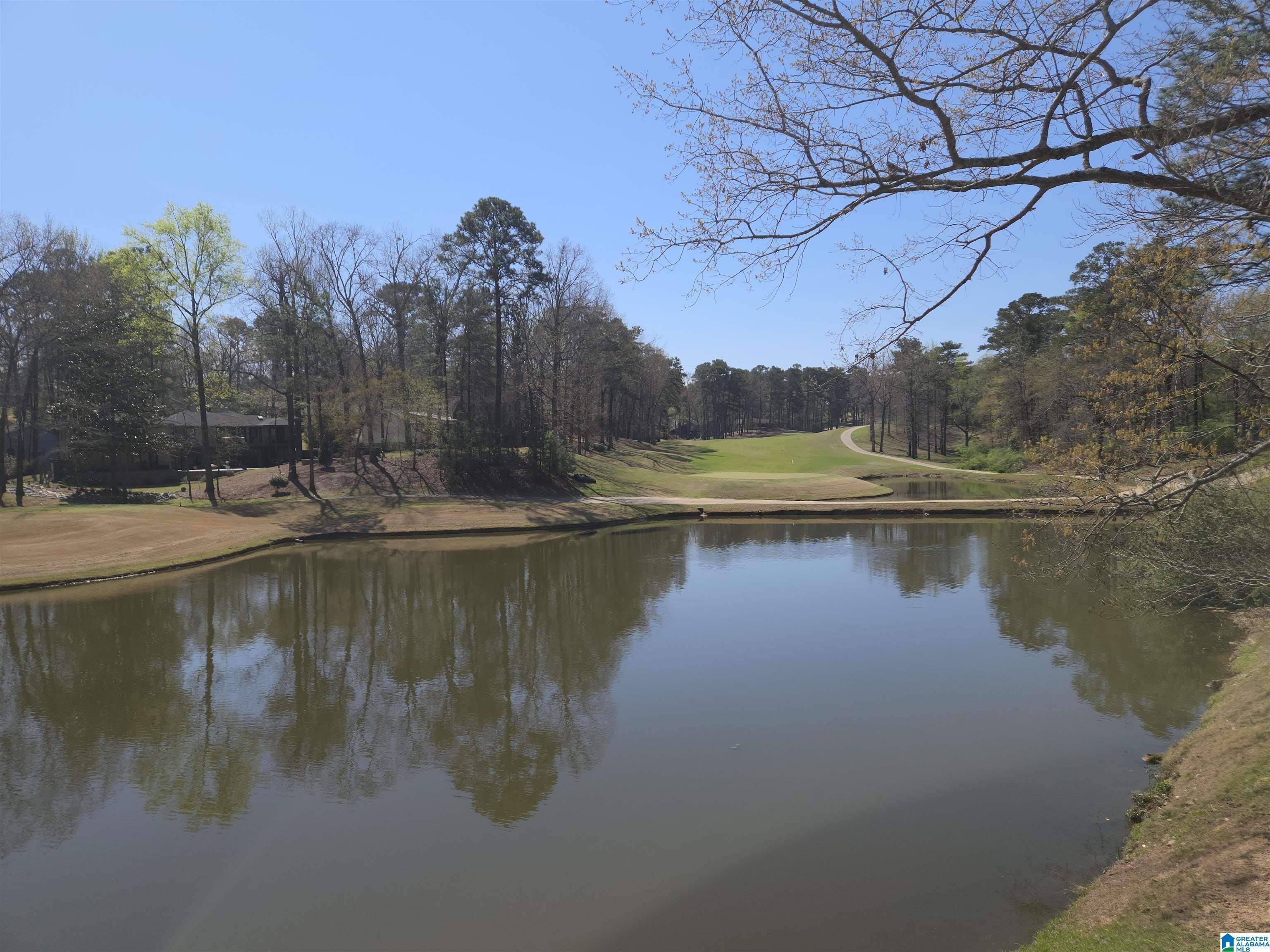 Image 1: DECK VIEW OF LAKE AND GOLF COURSE