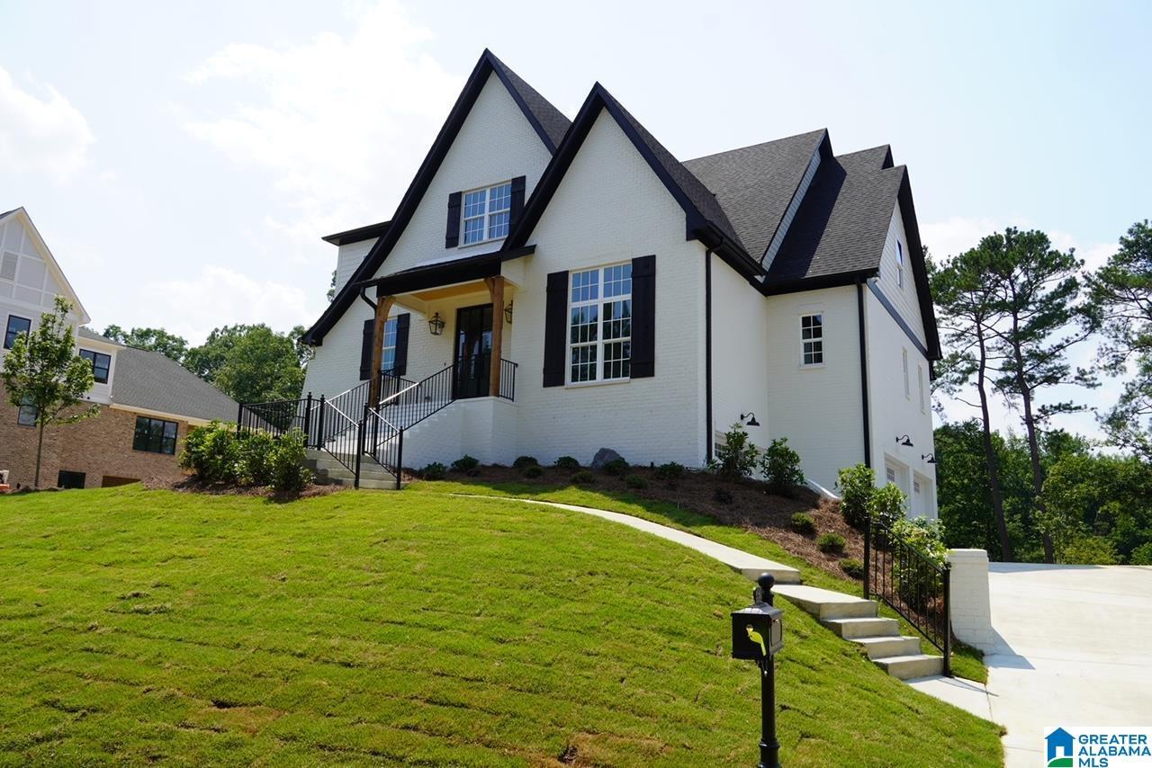 Image 0: the home pictured is smaller than the one being offered., similar home in another community