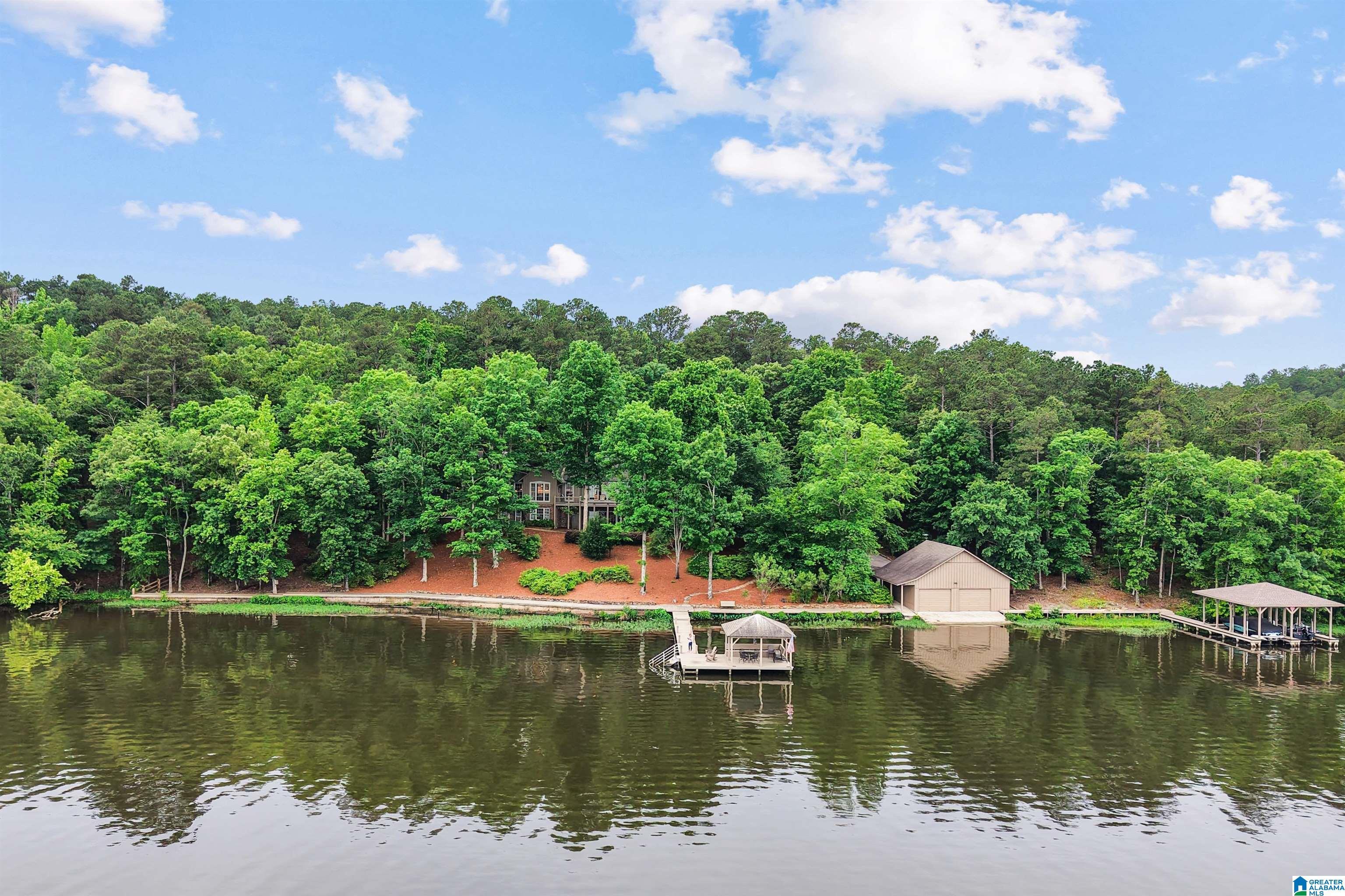 Image 1: Luxury lake front retreat with land