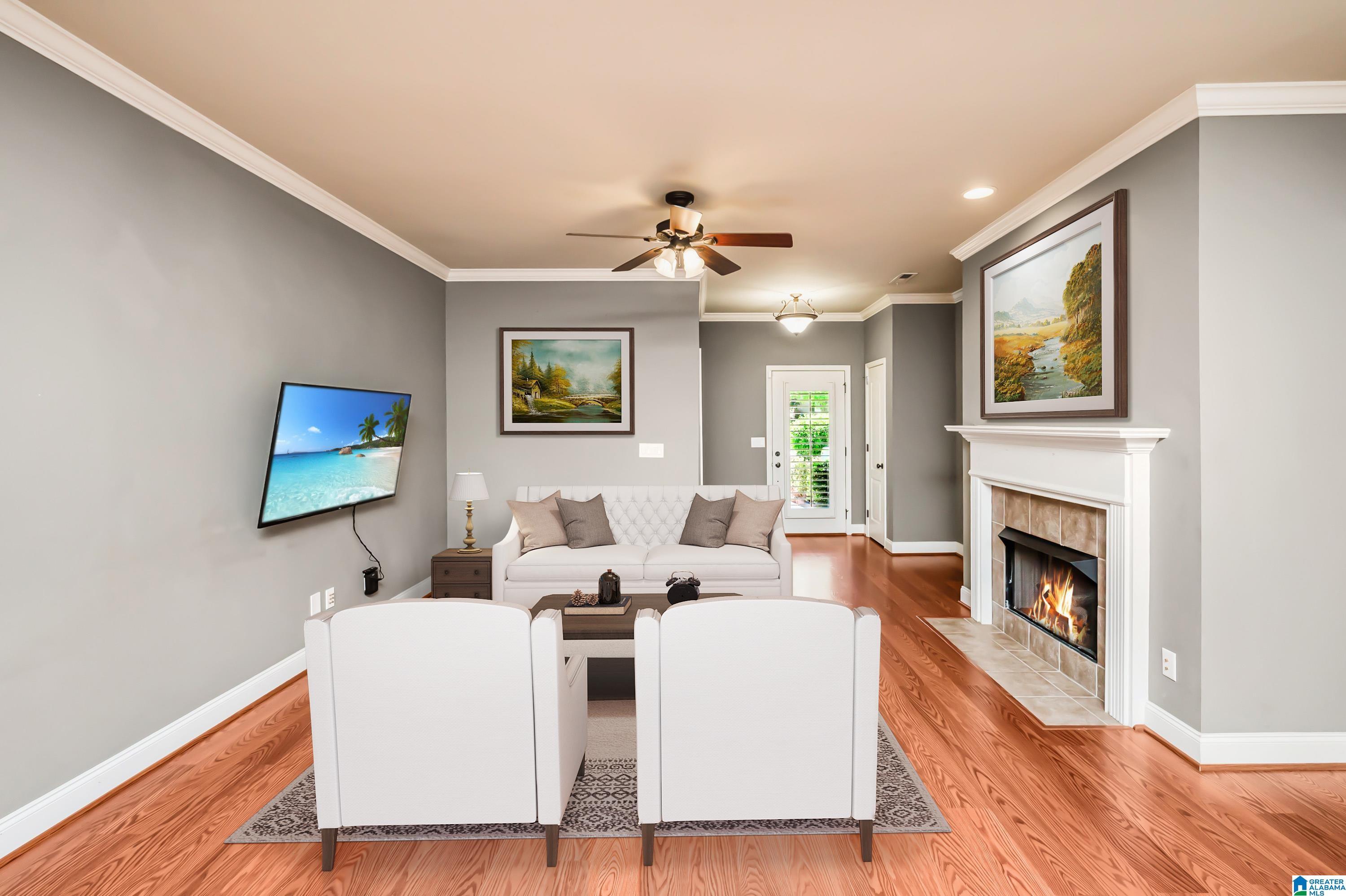 Image 2: Comfortable family room with fireplace