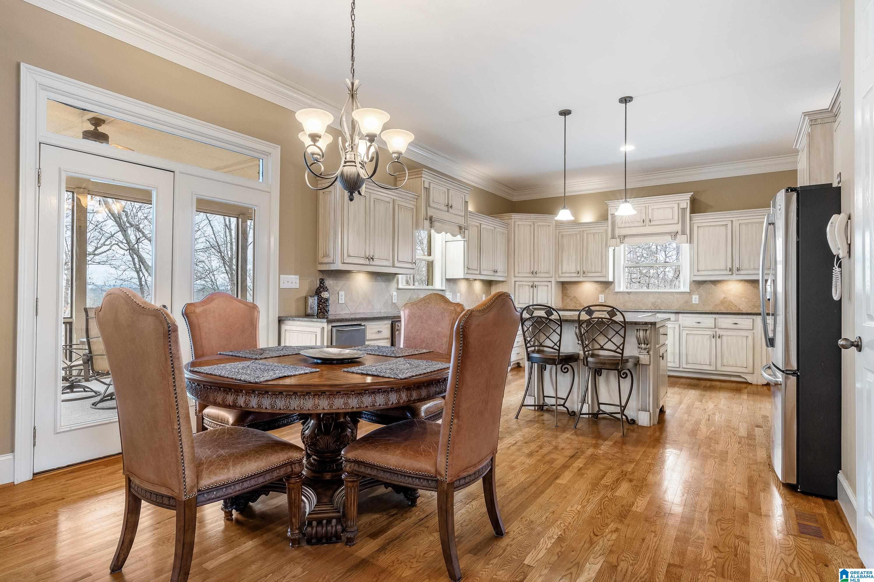 Image 4: Chef's Kitchen with an abundance of dining space