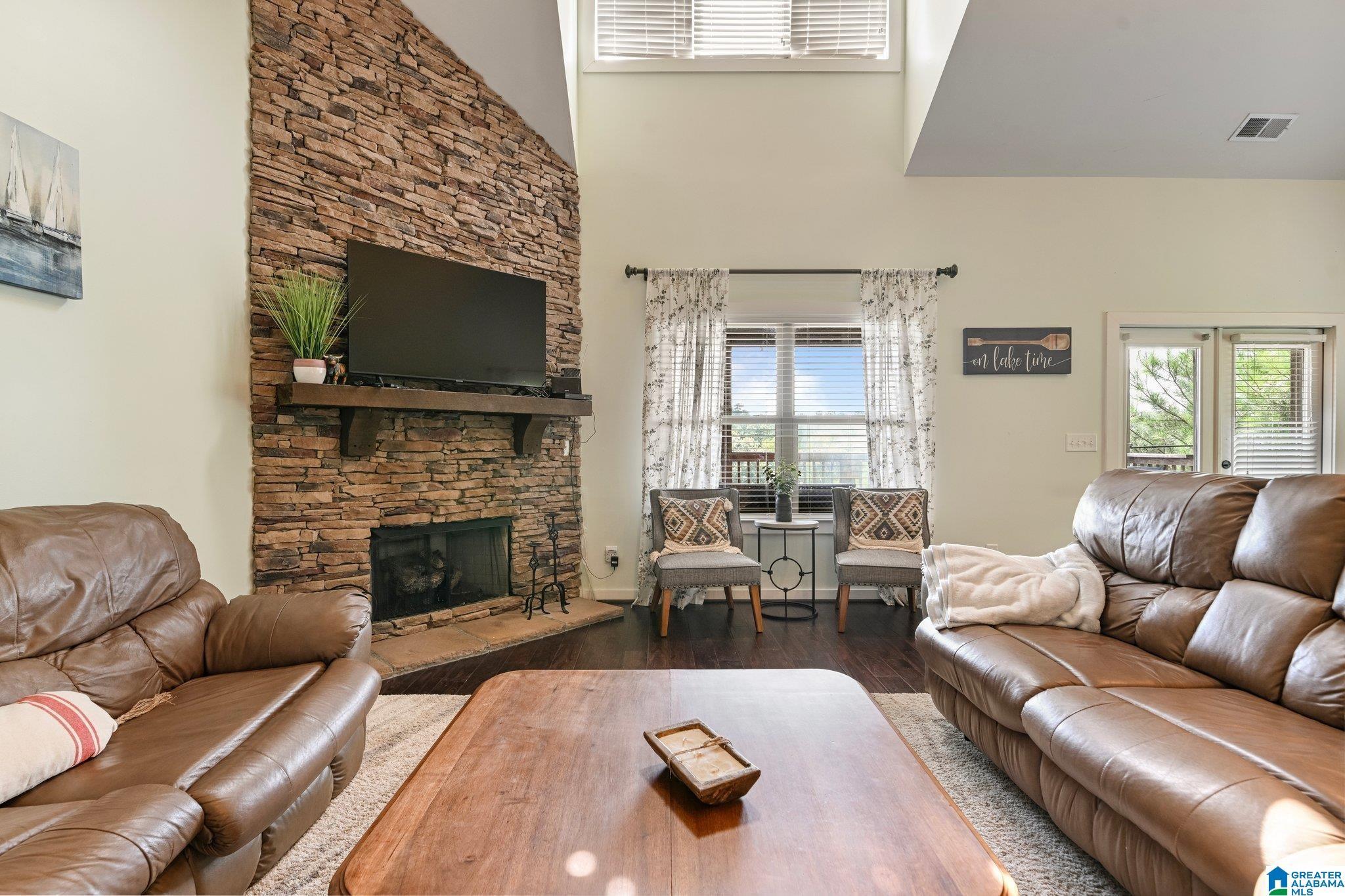 Image 3: Beautiful stone fireplace in family room