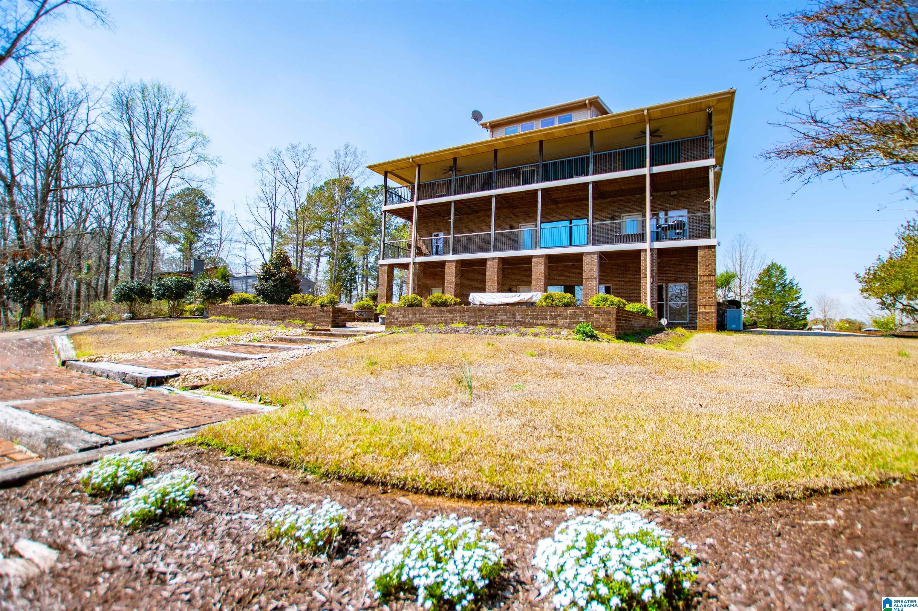 Image 2: VIEW OF HOME FROM WATER