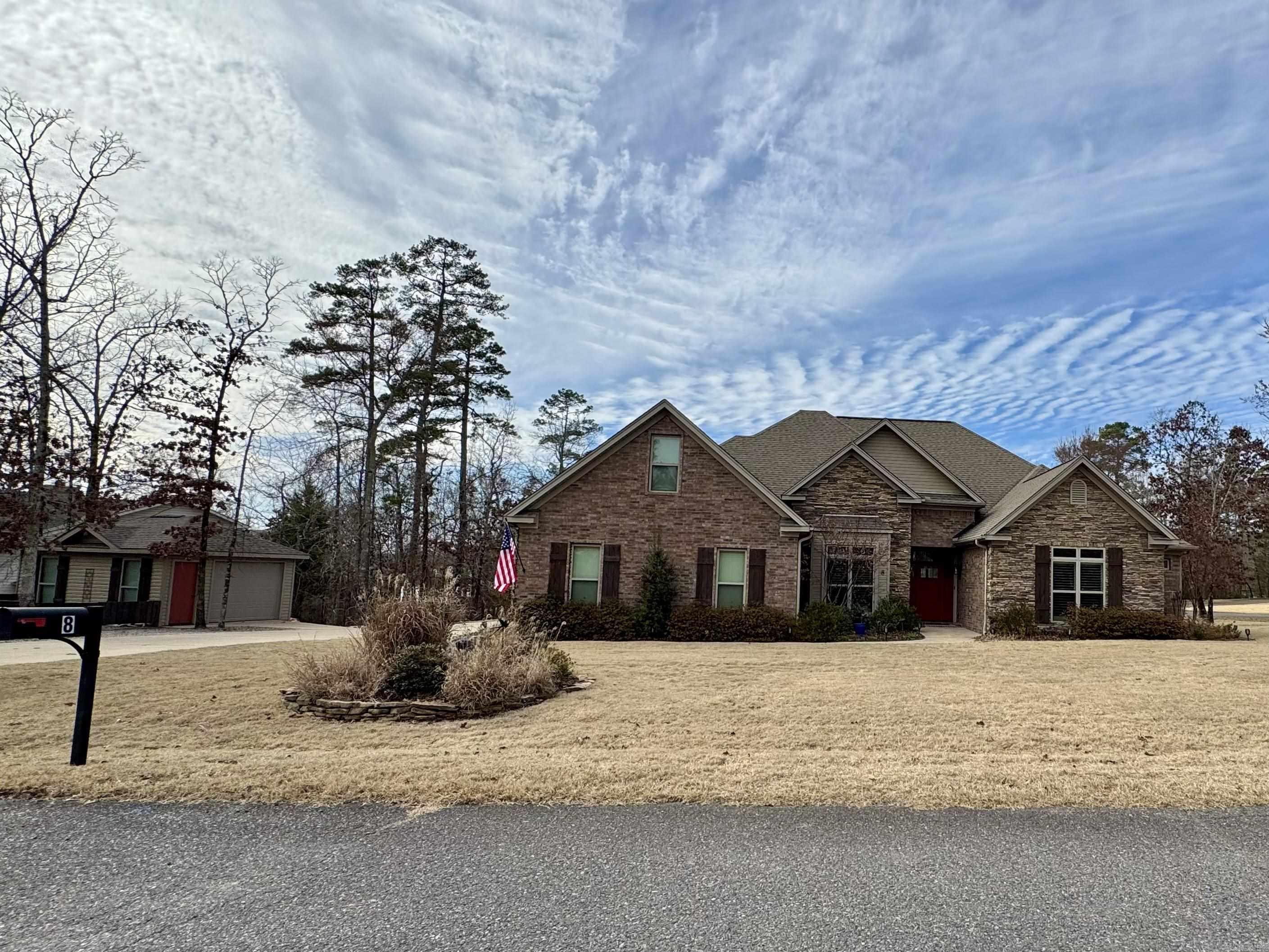 Image 1: Shop/ detached garage to the left.