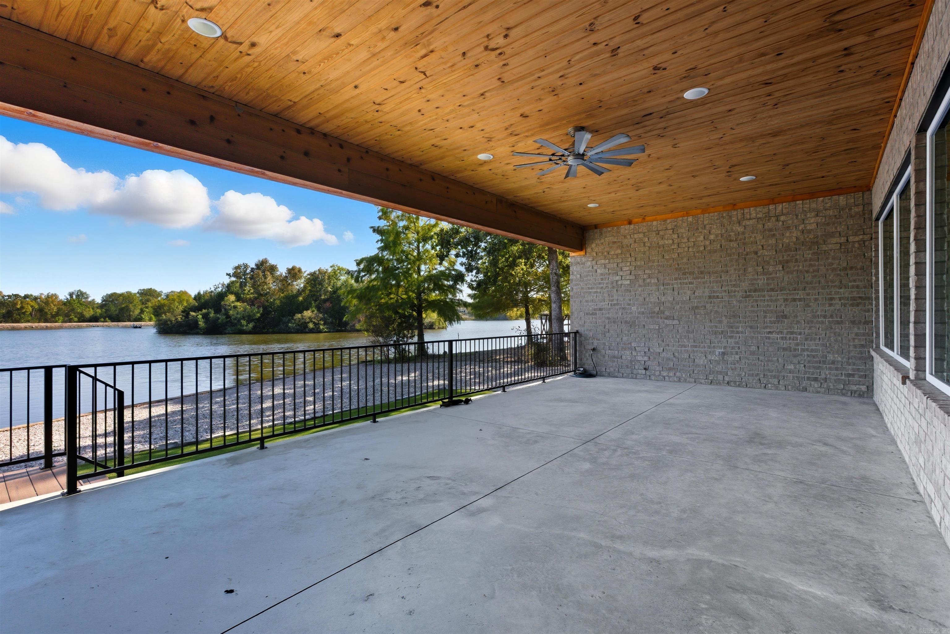Image 1: covered patio perfect for outdoor entertainment, Deck