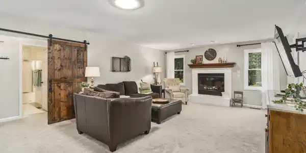 Image 3: open-concept living room with a cozy fireplace, Living Room