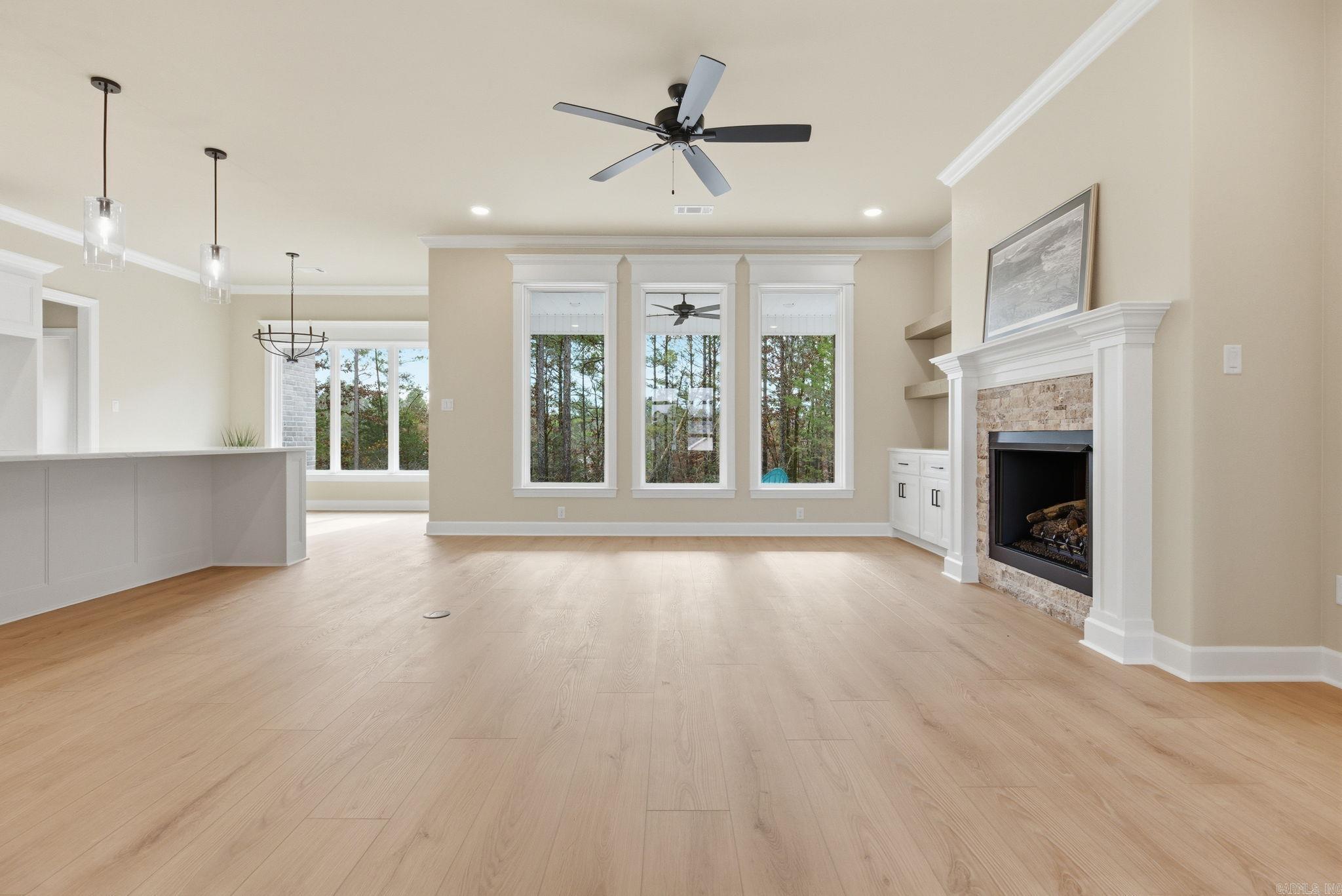 Image 3: open-concept living with luxury vinyl flooring, Living Room