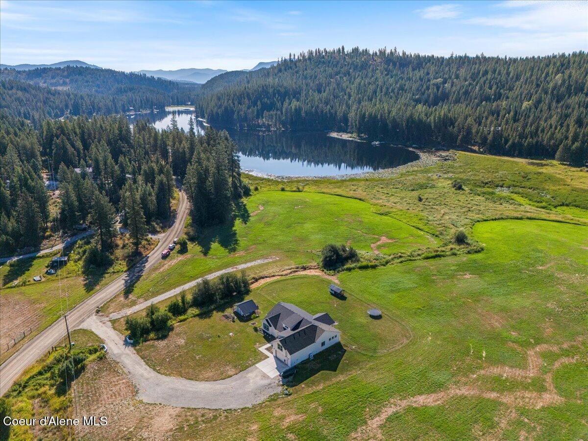 Image 3: 04-Aerial front of home